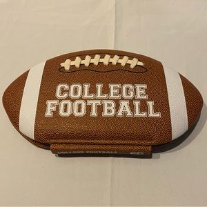 College Football book. Has the look an feel of a football.
